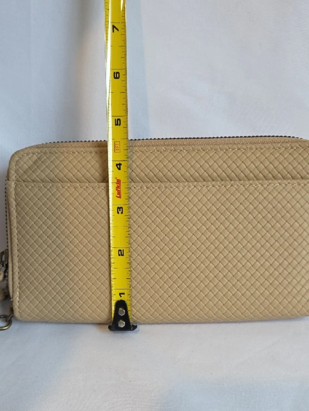 Safe Keeper Beige Textured Woven Zip Around Wristlet Wallet.